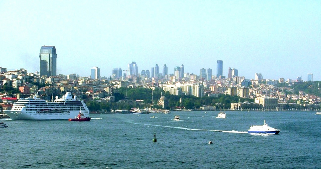 A passenger ferry and cruise ship in Istanbul harbor